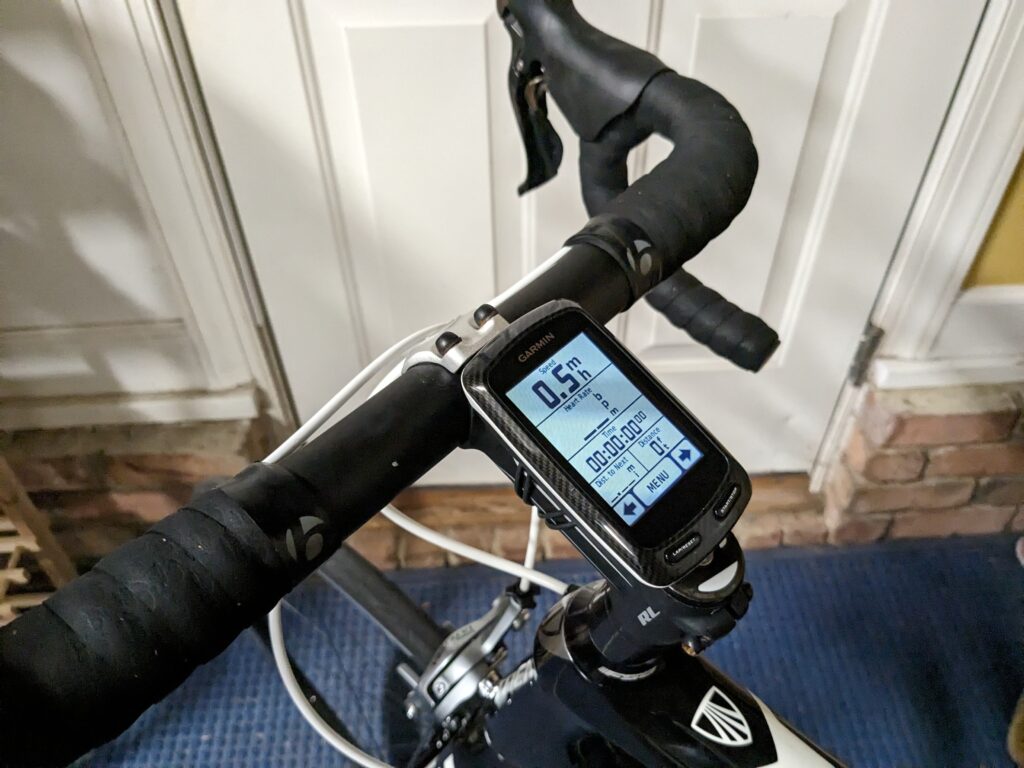 Photo of a Garmin Edge 800 bike computer attached to my bike handlebars.