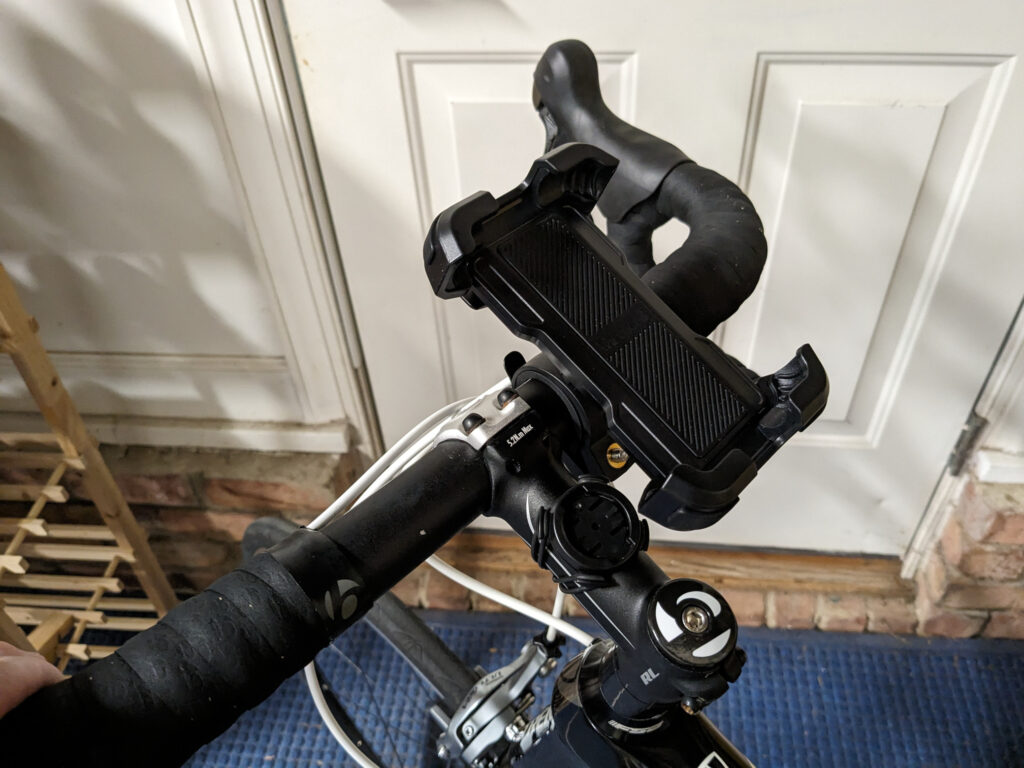 Photo of the phone mount attached to my bike handlebars.